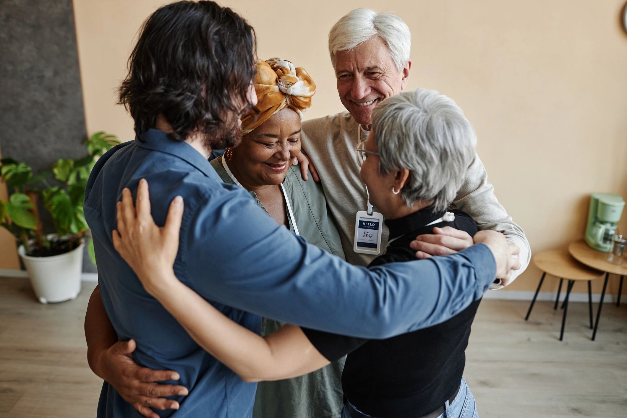 Senior community members embracing in celebration