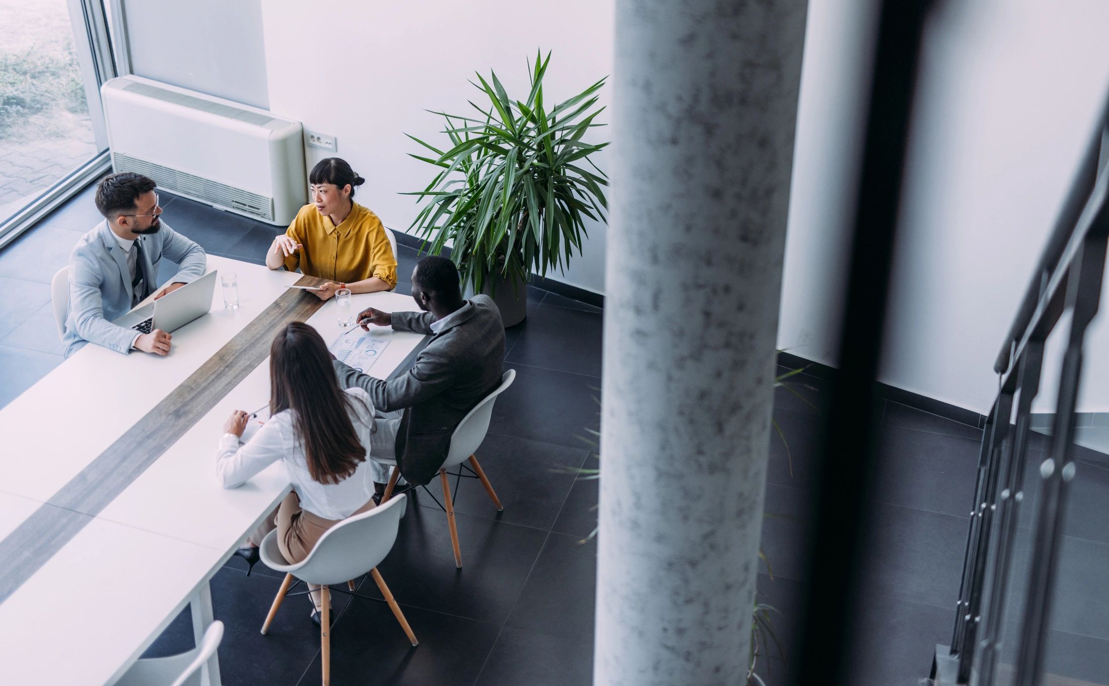 Entrepreneurs meeting together in an office board room